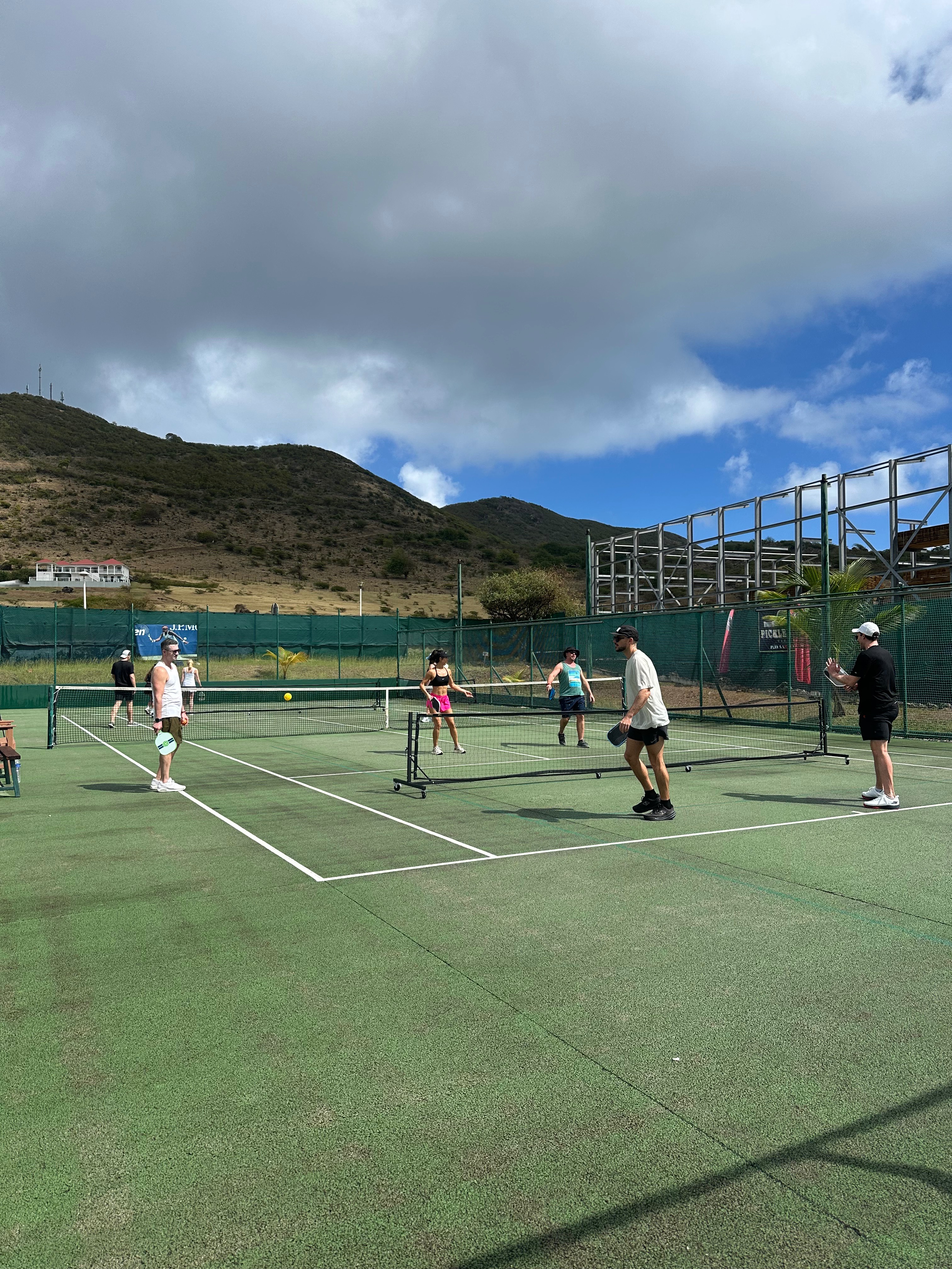 Players practicing at the American Tennis Club