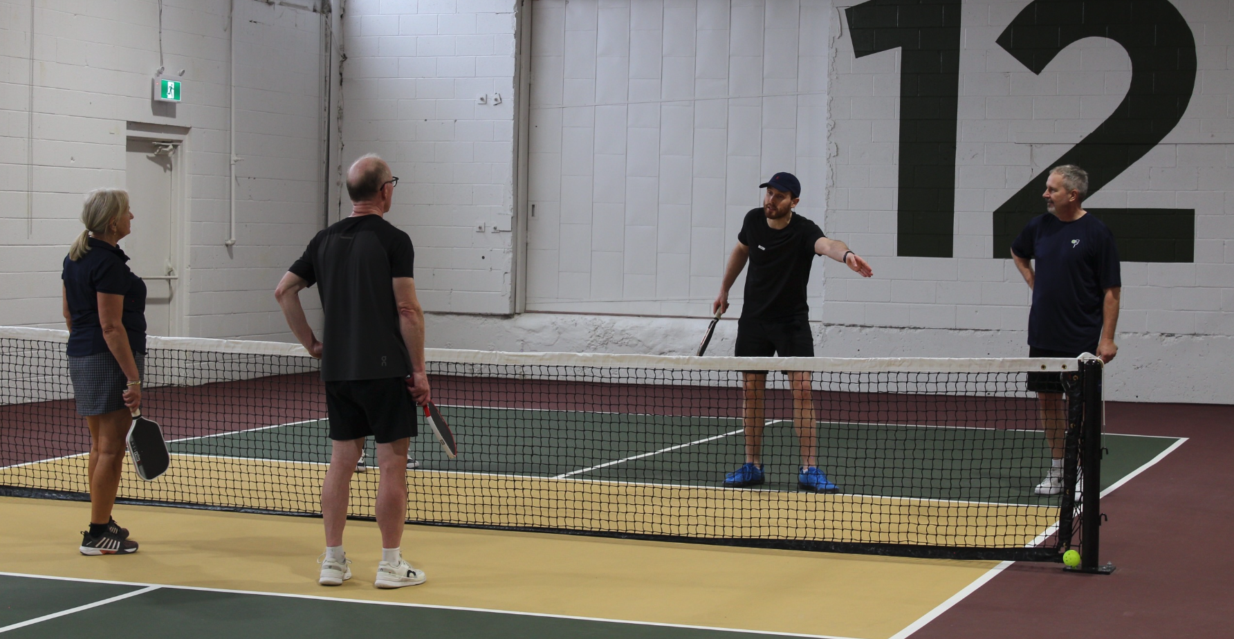 Joey Manchurek coaching beginner players at The Jar pickleball club in Toronto